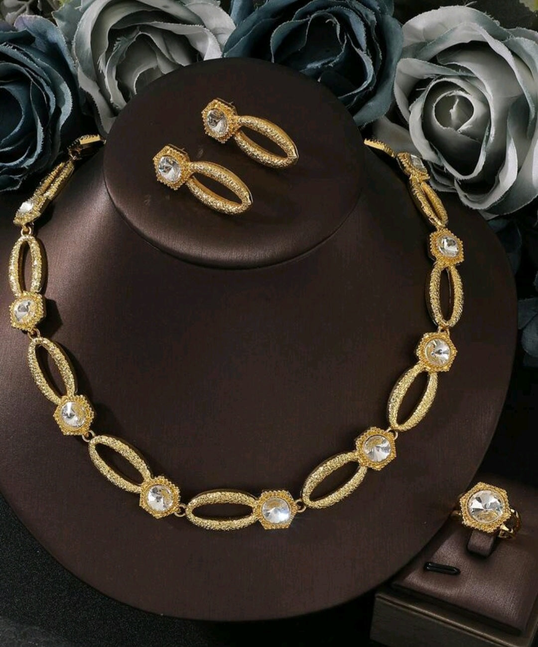 Ensemble boucle d'oreille collier bague