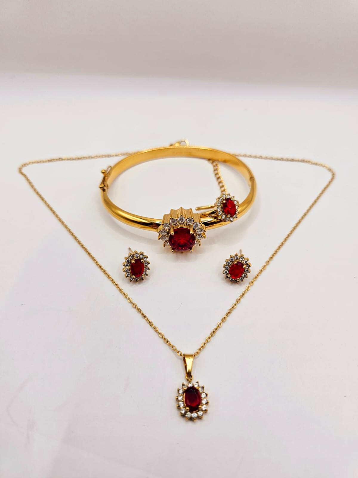 Ensemble collier boucles d'oreilles et bague
